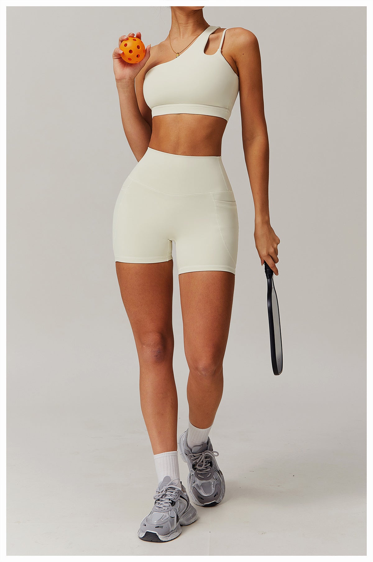 Women's new quick-drying nude sports inclined one-shoulder back yoga bra+pocket breathable fitness shorts